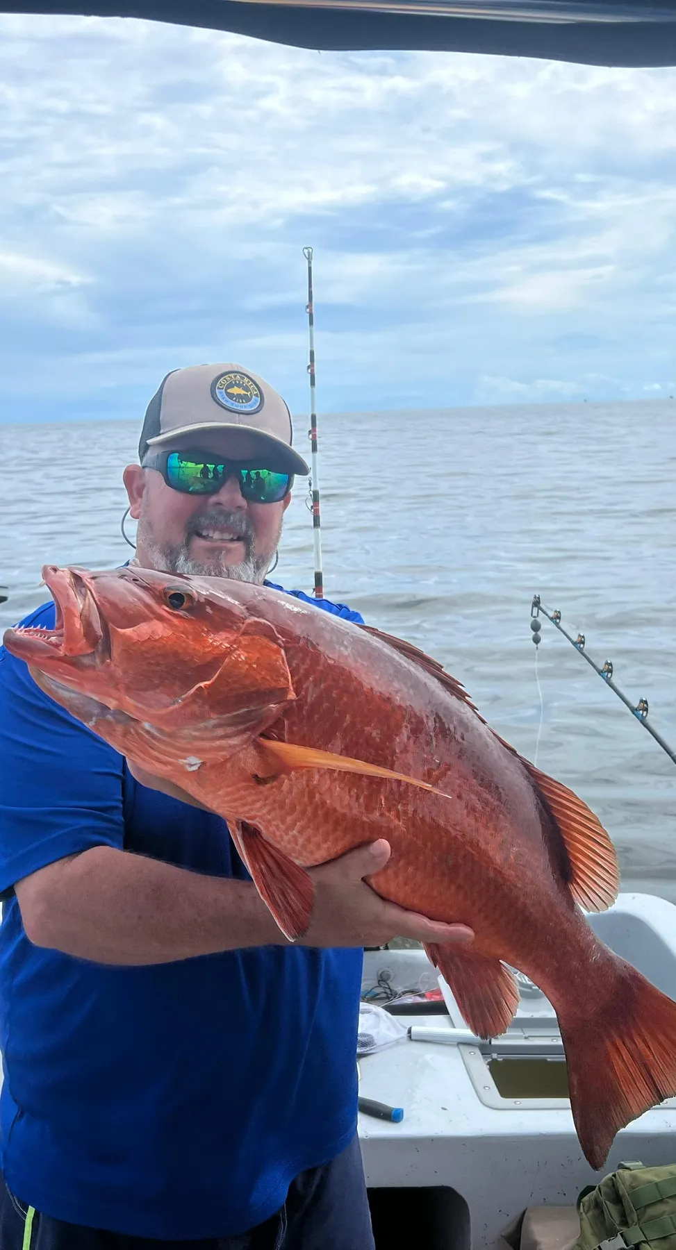 Angler with a Pacific red snapper aboard a charter on the Golfo Dulce, Costa Rica